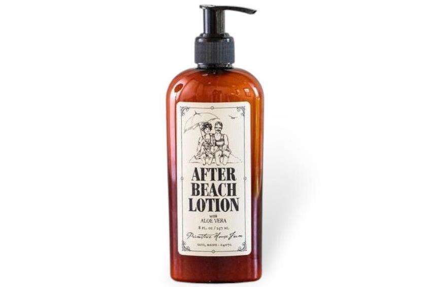 A brown bottle of "After Beach Lotion" with a black pump and vintage-style label.